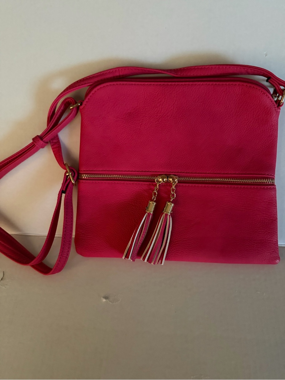Hot Pink Tassel Crossbody Bag with Gold Hardware